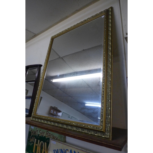 404 - A gilt framed mirror