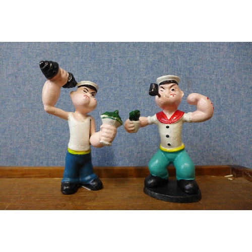 414 - A pair of painted cast iron figures of Popeye