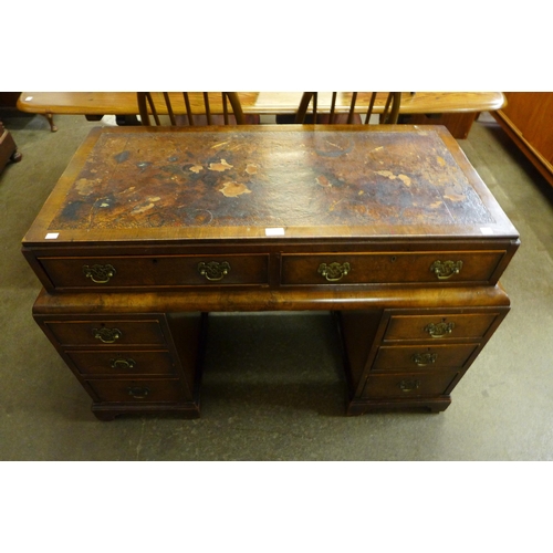 51 - An Art Deco burr walnut desk