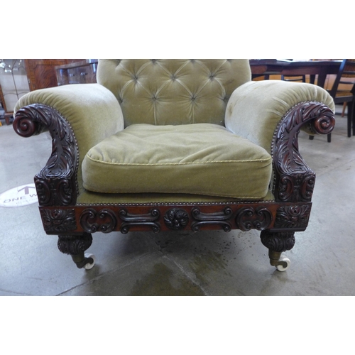 52 - An early Victorian Howard & Sons style carved mahogany and fabric upholstered country house armchair... 