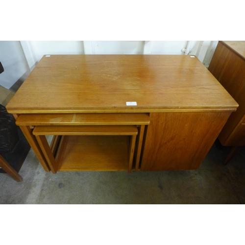 57 - A McIntosh Tristor teak fold over cabinet/table