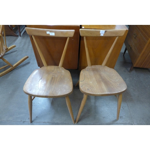 89 - A pair of Ercol Blonde elm and beech chairs