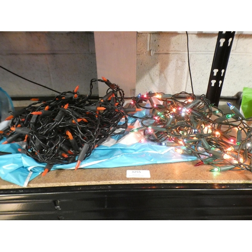 3255 - A set of multi-coloured Christmas lights and a set of red Christmas lights