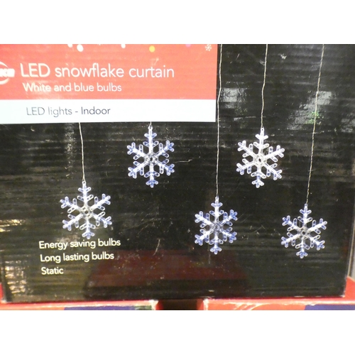 3257 - A box of LED snowflake lights & three boxes of 20 petal multi-coloured lights