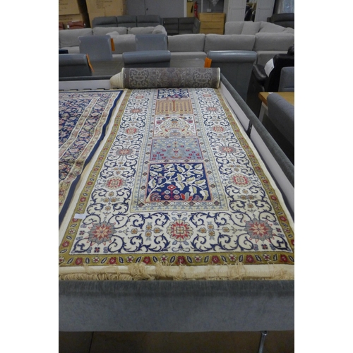 1561 - A large ivory ground full pile Kashmir style runner with  panel design, 500 x 80