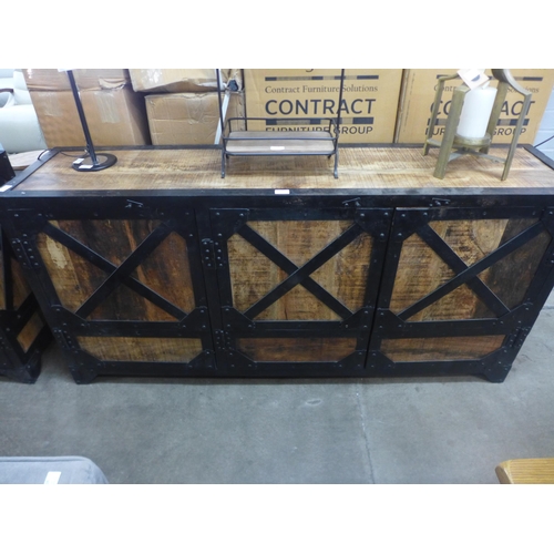 1474 - A steel framed industrial three door sideboard sticking doors