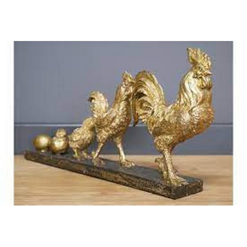 1399 - A chicken evolution gold sculpture, H 17cms x W 34cms (707611)   #