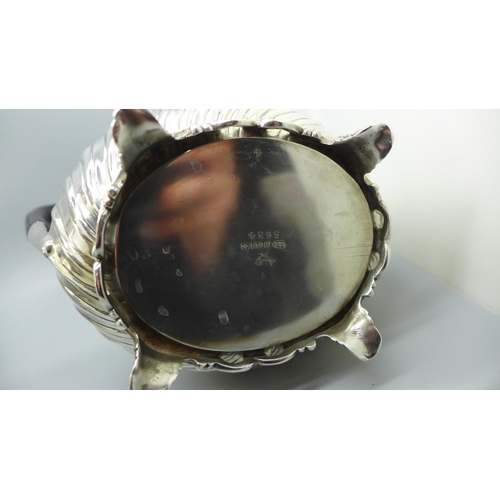 616 - A mid Victorian EPNS engraved coffee pot, a Roberts & Belk's EPNS coffee pot with pierced gallery