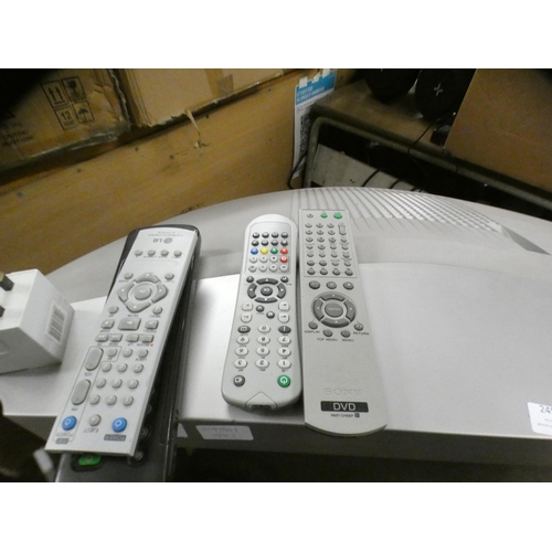 2455 - Sony Triatron colour TV on stand with Sony DVD player and remote controls