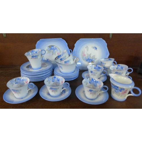 718 - A Shelley Phlox tea service, twelve cups, saucers and side plates, cream jug, sugar and two larger p... 