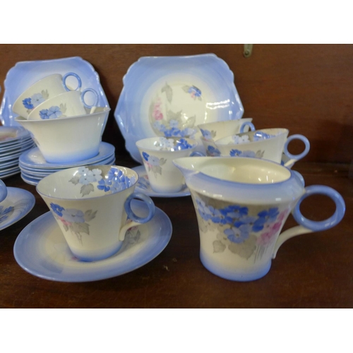 718 - A Shelley Phlox tea service, twelve cups, saucers and side plates, cream jug, sugar and two larger p... 