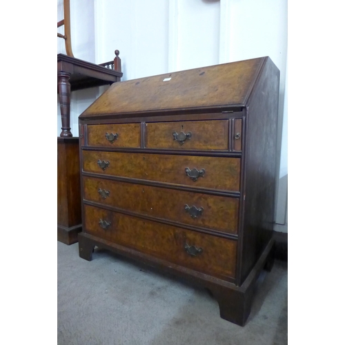 11 - A George III style burr walnut bureau