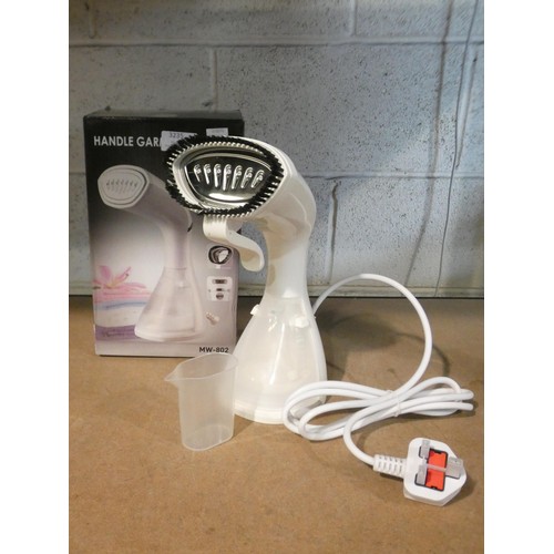 3080 - A white 1500w hand held garment steamer (model: MW-802)