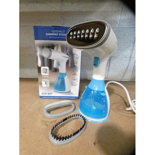 3090 - A white and blue 1700w hand held garment steamer (model: MW-801)