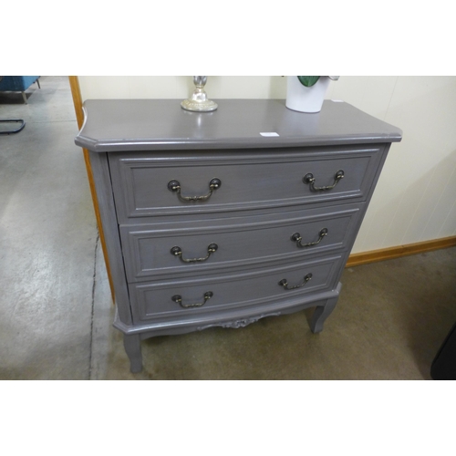 1435 - A grey French style three drawer chest