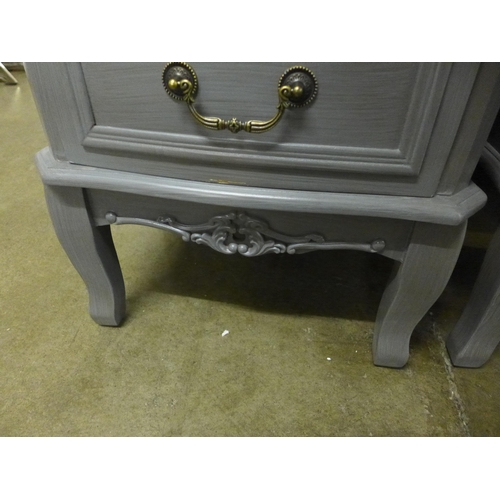 1437 - A two drawer grey bedside chest