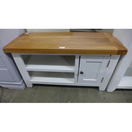 1780 - A Hampshire white painted oak small TV unit, damaged * this lot is subject to VAT