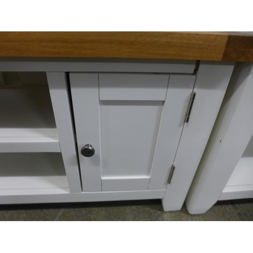 1780 - A Hampshire white painted oak small TV unit, damaged * this lot is subject to VAT