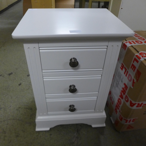 1795 - A Florence white painted oak three drawer bedside chest, damaged * this lot is subject to VAT