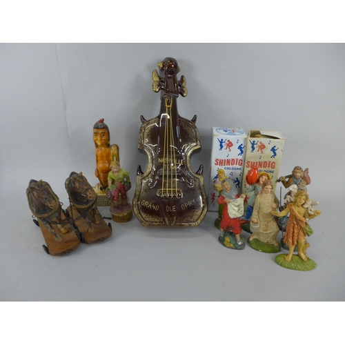 672 - Two bottles of Shindig cologne, a collection of Italian plastic figures, a double bass decanter, 195... 