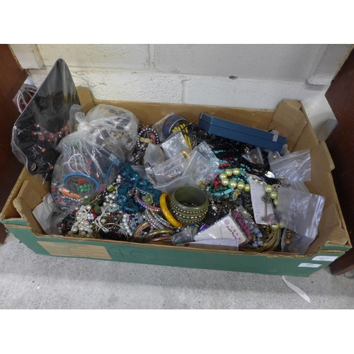 694 - A box of costume jewellery