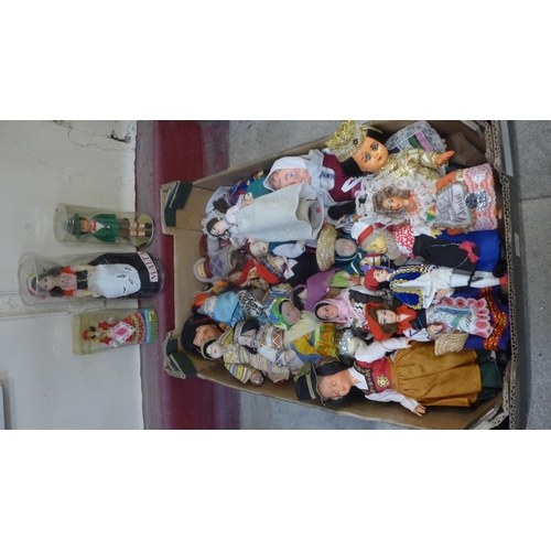 695 - A box of costume dolls