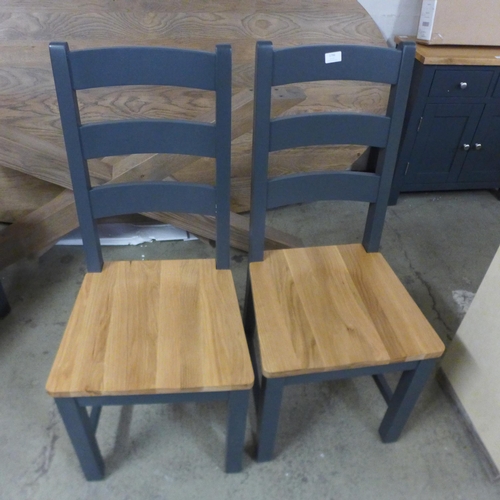 1796 - A Pair of Hampshire Blue painted oak ladder back chairs - Damaged *This Lot is Subject to VAT*