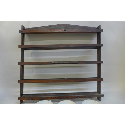 661 - A Japanese blue and white five setting tea set with wooden hanging rack