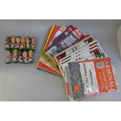 678 - Football programmes; Arsenal home and away, 1951 onwards (1951 x1, 1960's x2) and plastic Arsenal fo... 