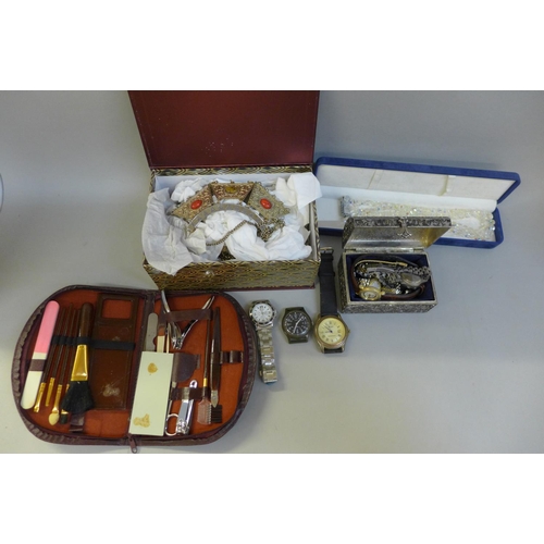 711 - A large collection of costume jewellery and wristwatches