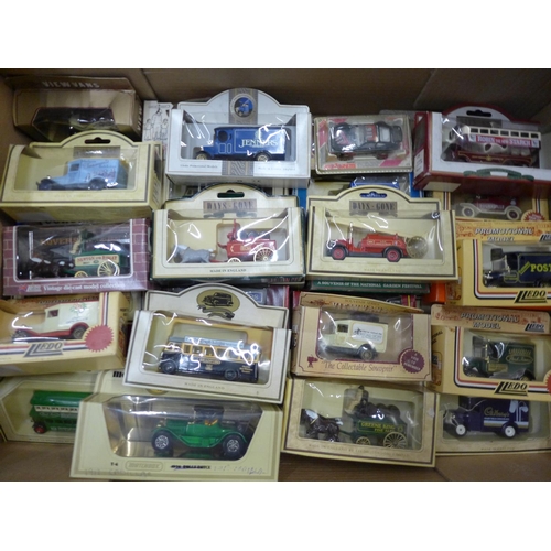 723 - A collection of Corgi, Lledo and other model vehicles, boxed