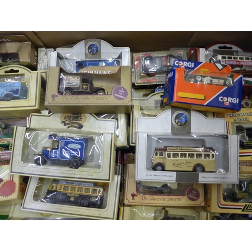 723 - A collection of Corgi, Lledo and other model vehicles, boxed