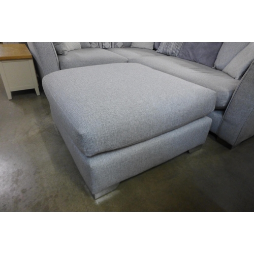 1307 - A designer grey upholstered corner sofa with footstool (different feet on footstool)