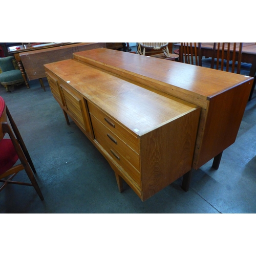 82 - A teak sideboard