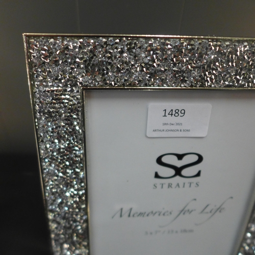 1469 - A silver photograph frame, 5