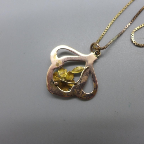 1006 - A 9ct gold Art Nouveau pendant and chain, 4.8g, chain 39cm and a/f, repaired