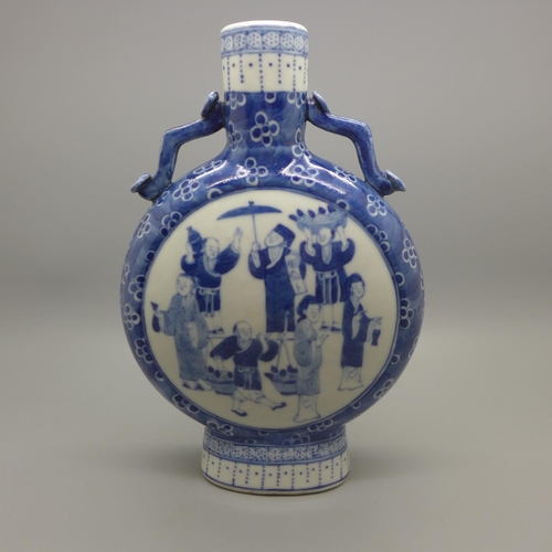 610 - A Chinese 19th Century blue and white moon flask vase with four character mark to the base, 21cm