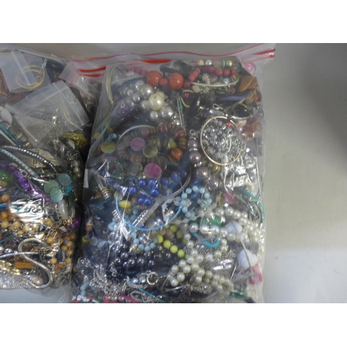 767 - Two bags of costume jewellery