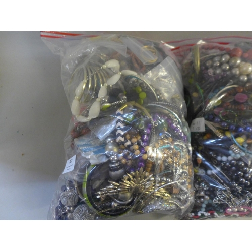 767 - Two bags of costume jewellery