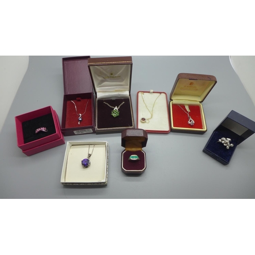 925 - Silver pendants and rings including one opal set