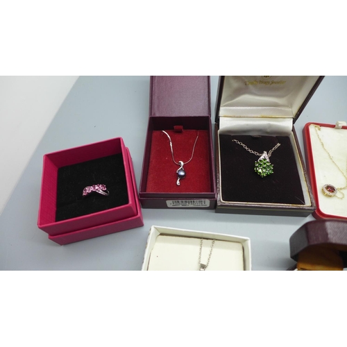 925 - Silver pendants and rings including one opal set