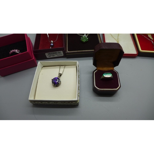 925 - Silver pendants and rings including one opal set