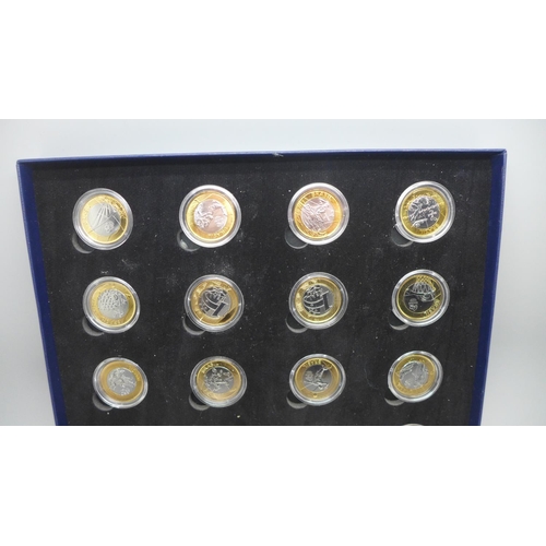 935 - A collection of sixteen Rio 2016 Olympic 1 Real coins, boxed and cased