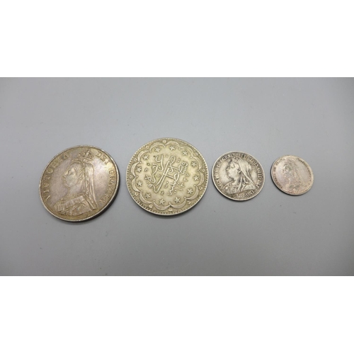 980 - A Victorian 1887 double florin, two other Victorian coins and on other coin