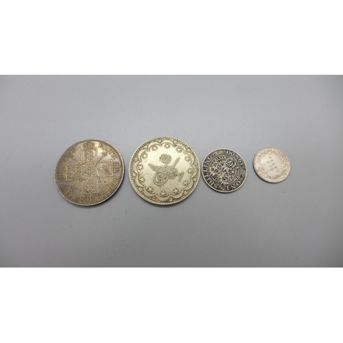 980 - A Victorian 1887 double florin, two other Victorian coins and on other coin