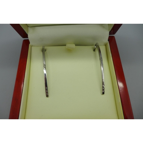 994 - A pair of silver and diamond 'Hot Diamonds' earrings, in original box