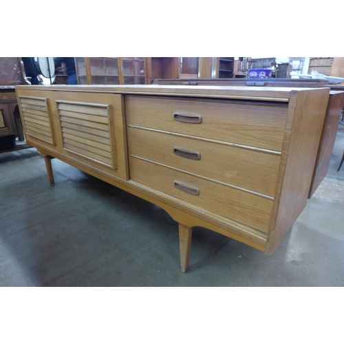 82 - A teak sideboard