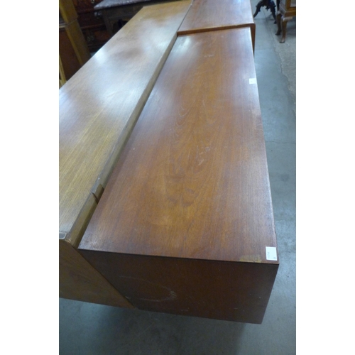 83 - A small teak sideboard