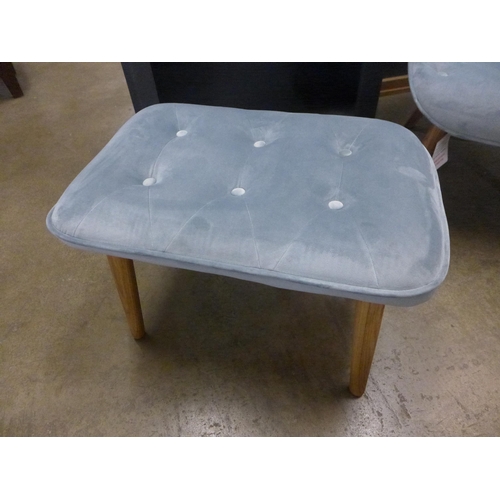 1304 - A Landale button back blue upholstered chair with footstool