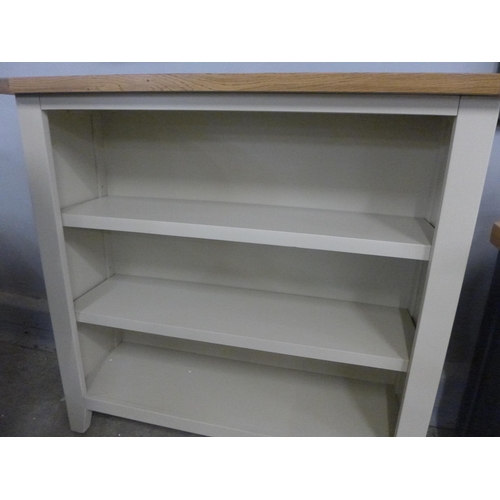 1452 - An oak and truffle painted bookcase *This Lot is Subject to VAT*